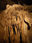 Pohled na sintrový vodopád v Jeskyních Na Pomezí.