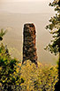 Izolovaná skalní věž (komín), jakožto jeden ze symbolů národního parku České Švýcarsko a oblíbený cíl horolezců (poprvé byla vylezena 27. 8. 1905). Pěkný pohled na Malý Pravčický kužel skýtá skalní vyhlídka u Pravčické brány.

