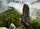 Izolovaná skalní věž (komín), jakožto jeden ze symbolů národního parku České Švýcarsko a oblíbený cíl horolezců (poprvé byla vylezena 27. 8. 1905). Pěkný pohled na Malý Pravčický kužel skýtá skalní vyhlídka u Pravčické brány.

