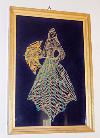 Obraz s paličkovou krajkou v penzionu Markéta