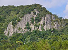 Nedaleko rekreačního areálu Zdravotník se vypíná hora Sedlo, jejíž vrchol byl dokonce pro své mimořádné přírodní hodnoty vyhlášen národní přírodní rezervací.

