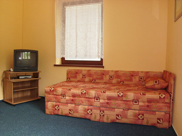 Obývací pokoj v apartmánu rodinného domu