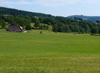 Panoramatický výhled na Olešnici a Krkonoše.