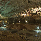 Nejrozsáhlejší zpřístupněný jeskynní systém v ČR. Tvoří jej rozlehlý komplex dómů, chodeb a obrovských podzemních propastí. Na jeskyně odkazuje i Jules Verne ve své knize Zelený paprsek.

